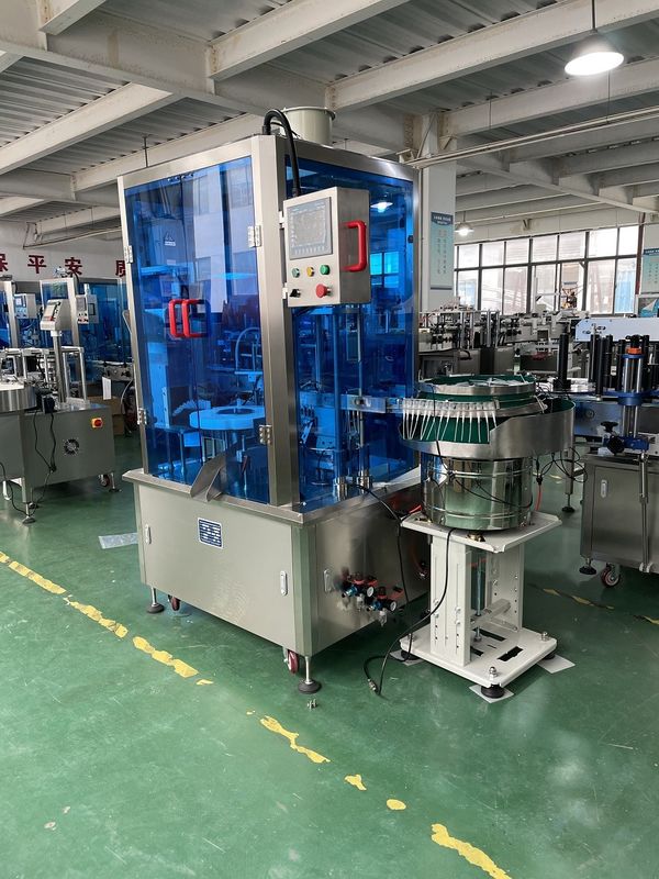 220V 50Hz 2kW automatyczna maszyna do napełniania i pokrywania wstrzykiwaczem z 1500-2000BPH i objętością napełniania 5-50ml